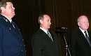 President Putin introducing the newly-appointed Prosecutor-General Vladimir Ustinov (left) to his staff. 