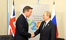With Prime Minister of the United Kingdom David Cameron.