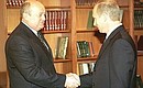President Putin with Mikhail Fradkov, Director of the Federal Tax Police Service.