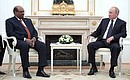 With President of the Republic of Sudan Omar Al-Bashir.