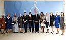 Before the business breakfast for the spouses of G8 leaders and heads of delegation of African countries. Left to right: Viviane Wade, wife of President of Senegal, Dominique Folloroux-Ouattara, wife of President of Cote d’Ivoire, Patience Jonathan, wife of President of Nigeria, Yoo Soon-taek, wife of UN Secretary-General, Carla Bruni, wife of President of France, Michel Sidibe, Executive Director of Joint UN Programme on HIV/AIDS (UNAIDS), Michel Kazatchkine, Executive Director of Global Fund to Fight AIDS, Tuberculosis and Malaria, Djen Kaba Conde, wife of President of Guinea, Geertrui Windels, wife of European Council President, Laureen Harper, wife of Prime-Minister of Canada, Svetlana Medvedeva, and Margarida Sousa Uva, wife of European Commission President.