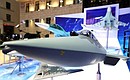 Перед началом заседания коллегии Министерства обороны Президент осмотрел выставку перспективных образцов вооружения и техники.