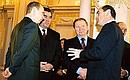 С Президентом Таджикистана Эмомали Рахмоновым, Президентом Украины Леонидом Кучмой и Президентом Армении Робертом Кочаряном (слева направо).