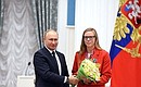 Presenting state decorations to winners of the 2020 Summer Paralympic Games in Tokyo. Darya Pikalova, winner of a gold medal, two silvers and a bronze in swimming at the Paralympics, receives the Order of Friendship. Photo: RIA Novosti