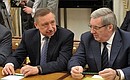 Before the start of an expanded format meeting of the Security Council. Presidential Plenipotentiary Envoy to the Central Federal District Alexander Beglov (left) and Presidential Plenipotentiary Envoy to the Siberian Federal District Viktor Tolokonsky.