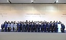 The heads of delegations attending the Russia-Africa Summit pose for photographs.