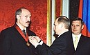 Церемония награждения Президента Белоруссии Александра Лукашенко орденом «За заслуги перед Отечеством» II степени.