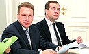 Prime Minister Dmitry Medvedev and First Deputy Prime Minister Igor Shuvalov (left) at a meeting on economic issues.