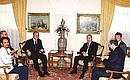 President Putin at a restricted meeting with U.S. President George Bush.