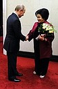 With the Malaysian Prime Minister’s wife.
