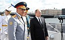 Navy Day celebrations. Aboard a motor boat Vladimir Putin inspected Navy combat ships and greeted service personnel on Navy Day.
