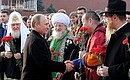 Before laying flowers at the monument to Kuzma Minin and Dmitry Pozharsky on Red Square. With heads of Russia’s traditional religions.