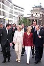 President Vladimir Putin and his wife Lyudmila, Gerhard Schroeder and his wife Doris Schroeder-Kepf walking around the city.