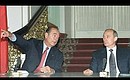 President Putin with French President Jacques Chirac at a news conference.