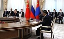В ходе встречи с Председателем КНР Си Цзиньпином и Президентом Монголии Ухнагийн Хурэлсухом. Фото ТАСС