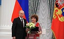 Presenting Russian Federation state decorations. The Honoured Healthcare Worker of the Russian Federation honorary title is conferred on head nurse at Novgorod Region Tuberculosis Dispensary Vera Rybnikova.