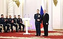 Presentation of Gold Star medals to Heroes of Russia. With Senior Sergeant Maxim Potashev. Photo: Valery Sharifulin, TASS