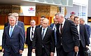 With Deputy Prime Minister Dmitry Rogozin and Rosneft CEO Igor Sechin, left, at Zvezda shipyard.
