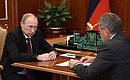 At a working meeting with Defence Minister Sergei Shoigu.