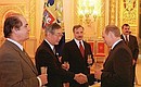 President Putin with Ambassador of Cyprus Andreas Georgiadis (right), Ambassador of Japan Issey Nomura (centre) and Ambassador of Hungary Ferenc Kontra. 