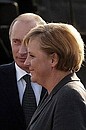 With Federal Chancellor of Germany Angela Merkel. Photo: Sergey Guneev, RIA Novosti