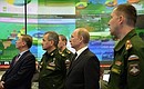Во время посещения Национального центра управления обороной Российской Федерации.