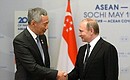 With Prime Minister of Singapore Lee Hsien Loong. Photo: russia-asean20.ru