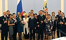Members of the Tu-154 crew with their families and friends after the awards ceremony.
