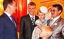 With Vladimir Belyaev, recipient of the Order of Parental Glory, and his children.