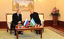 С Президентом Узбекистана Исламом Каримовым в аэропорту города Ташкент.