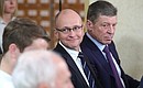 First Deputy Chief of Staff of the Presidential Executive Office Sergei Kiriyenko and Deputy Prime Minister Dmitry Kozak (right) at a meeting with the public of Crimea and Sevastopol.