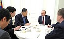 В ходе встречи с бывшим премьер-министром Японии Ёсиро Мори.