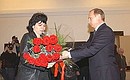 President Putin giving state decorations to the relatives of killed security personnel.