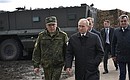 Supreme Commander-in-Chief of Russia’s Armed Forces Vladimir Putin observed the main stage of Vostok-2018 military manoeuvres. With Chief of the General Staff of Russia’s Armed Forces, First Deputy Defence Minister Valery Gerasimov.