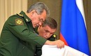 Defence Minister Sergei Shoigu and Chief of Russian Armed Forces General Staff and First Deputy Defence Minister Valery Gerasimov before the start of a meeting on Armed Forces development.
