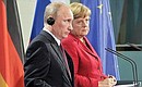 At a news conference following Russian-German talks. With Federal Chancellor of Germany Angela Merkel.