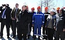 With workers of the Vostochny Space Launch Centre before the launch of the Soyuz-2.1a carrier rocket.