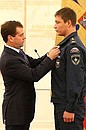 Ceremony awarding state decorations. Denis Gilmutdinov, a fireman from a fire-fighting unit in the Republic of Bashkortostan, was awarded the Order of Courage.