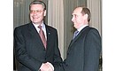 President Putin with Moldovan President Petru Lucinschi.
