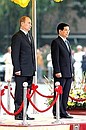 During the official welcoming ceremony with Vietnamese President Nguyen Minh Triet.