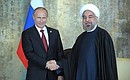 With President of the Islamic Republic of Iran Hassan Rouhani.