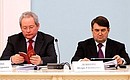 Regional Development Minister Viktor Basargin and Transport Minister Igor Levitin at a State Council Presidium meeting on increasing state guarantees of consumer rights protection.