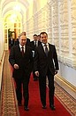 With Prime Minister Vladimir Putin before the meeting with pensioners and veterans.