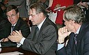 International Olympic Committee President Jacques Rogge, with Jean-Claude Killy (left), head of the IOC Coordination Commission for the XXII Olympic Games in Sochi in 2014, and Gilbert Felli (right), IOC Executive Director.
