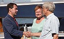 На катере «Култаранта VIII». С Президентом Финляндии Тарьей Халонен и её супругом Пентти Араярви.