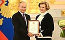 Ceremony to mark 100th anniversary of State Sanitary and Epidemiological Service. With Anna Popova, Head of the Federal Service for the Oversight of Consumer Protection and Welfare [Rospotrebnadzor] – Chief State Sanitary Physician of Russia. Photo: Pavel Bednyakov, RIA Novosti
