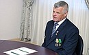 During a meeting with Rossiya-Agro company workers. Hero of Labour Yury Konnov, farm machinery engineer at Rossiya-Agro.