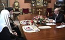 Во время встречи с главой Коптской церкви Патриархом Тавадросом II.