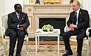 С Президентом Зимбабве Робертом Мугабе.