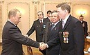 President Putin before a meeting with army officers and soldiers who served in Afghanistan.